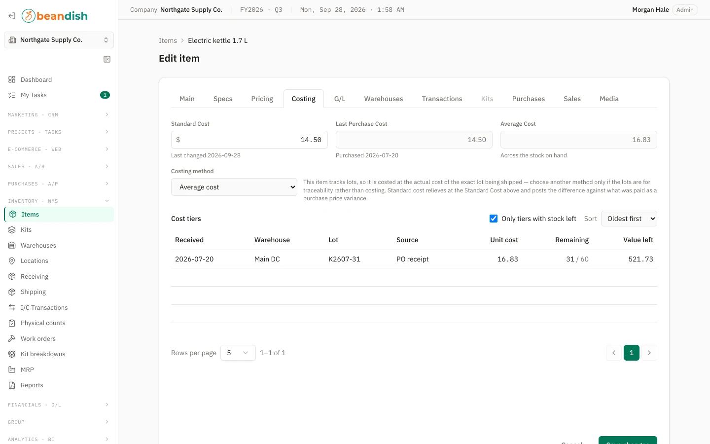An item's Costing tab showing standard, last purchase and average cost above a table of open cost layers
