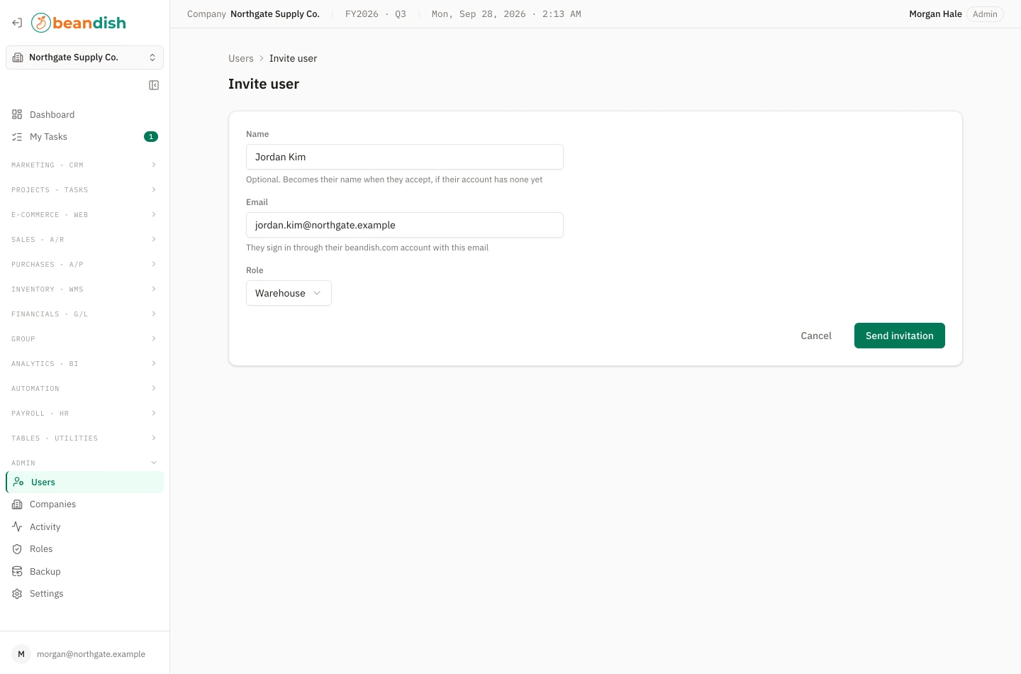 The invite user form: the person’s optional name, the email address they sign in with and the role they will hold, with Cancel and Send invitation